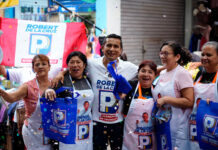 Robert de la Cruz recibe gran respaldo de dirigentes y comerciantes del mercado La Hermelinda
